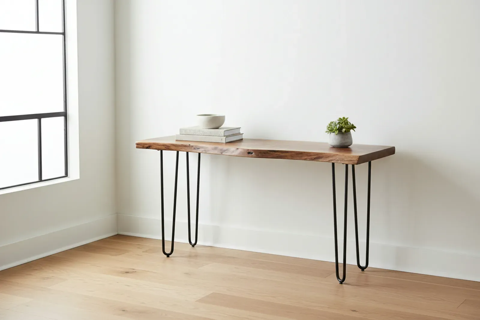 Live edge walnut console table against a white wall