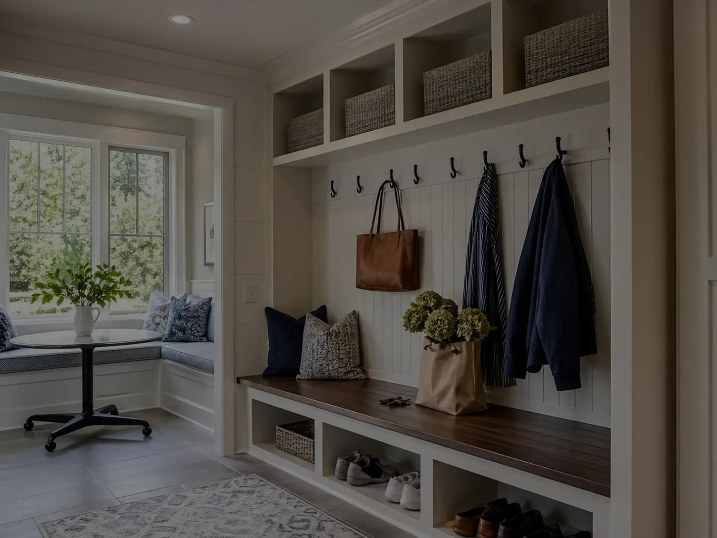 Mudroom bench with cubbies, coat hooks and shoe storage